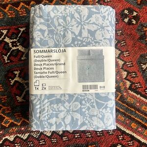 IKEA new unopened Queen size sheets, fun blue floral print